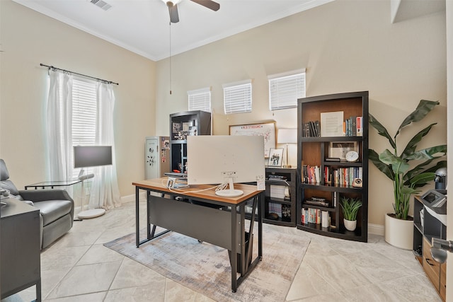 tiled home office featuring ceiling fan and crown molding