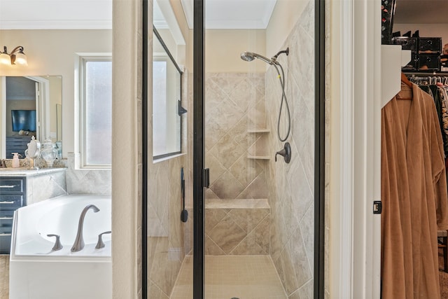 bathroom featuring ornamental molding, vanity, and plus walk in shower