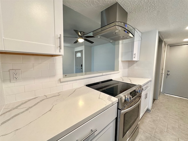 kitchen featuring white cabinetry, ceiling fan, electric range, and tasteful backsplash