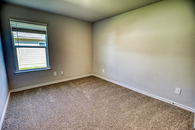 spare room with carpet flooring