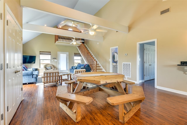 dining room featuring high vaulted ceiling, beam ceiling, ceiling fan, and dark hardwood / wood-style floors