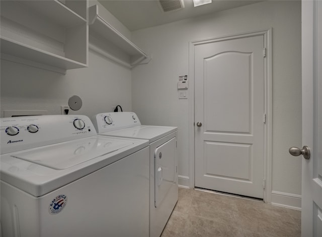 laundry area featuring washer and clothes dryer