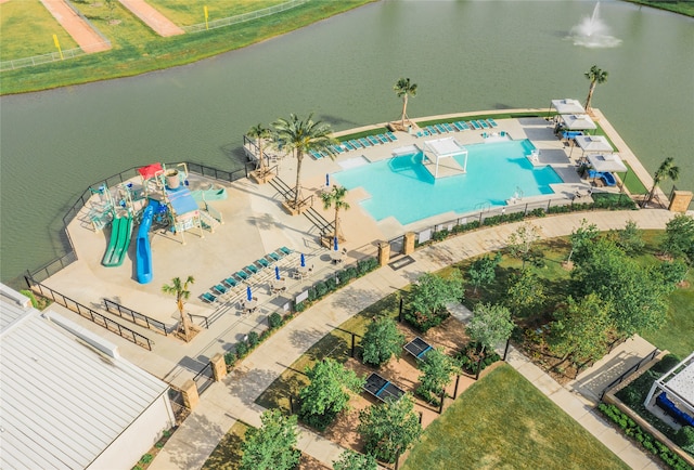 birds eye view of property with a water view