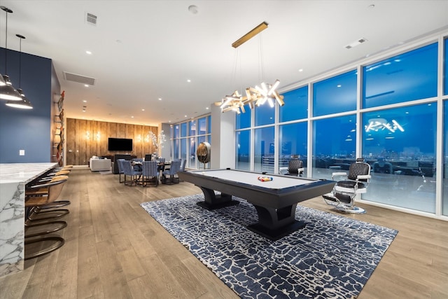 4521 San Felipe St Unit 3202, Houston, TX 77027 - game room featuring wood finished floors and visible vents