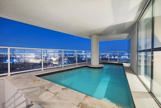 4521 San Felipe St Unit 3202, Houston, TX 77027 - view of swimming pool with a view of city lights and a swimming pool