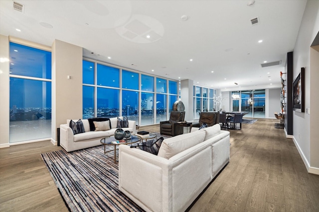 living room featuring hardwood / wood-style floors and expansive windows