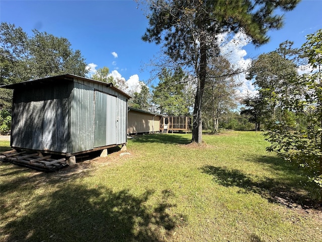 view of yard with a storage shed