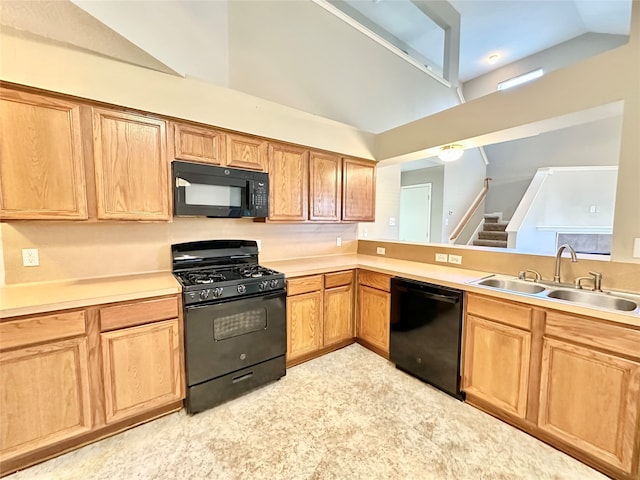 kitchen with black appliances and sink