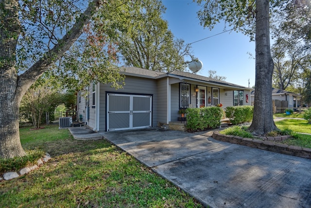 single story home with a front lawn and central AC unit