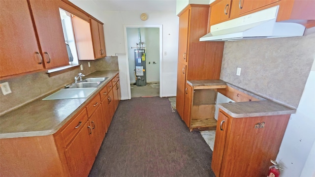 kitchen with gas water heater and sink