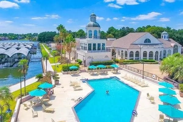 view of swimming pool featuring a patio area