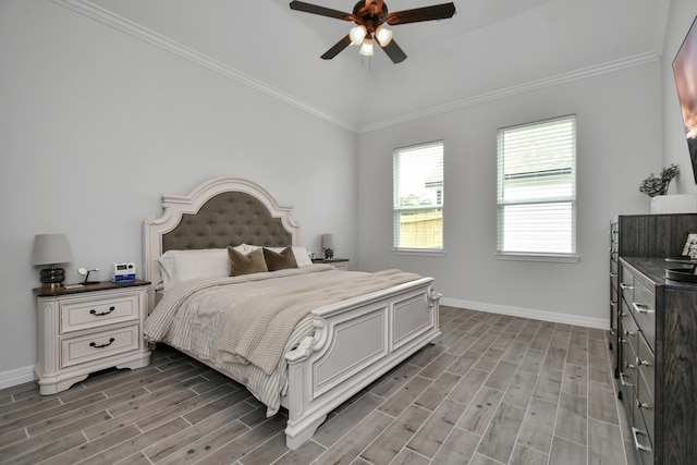 bedroom with crown molding, vaulted ceiling, ceiling fan, and light hardwood / wood-style flooring