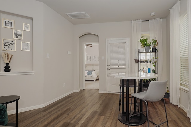 interior space with dark hardwood / wood-style flooring