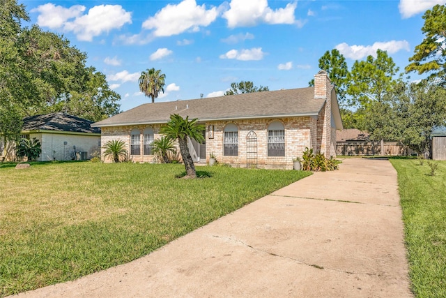 view of front of home with a front lawn