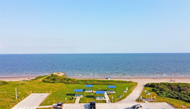 property view of water featuring a beach view