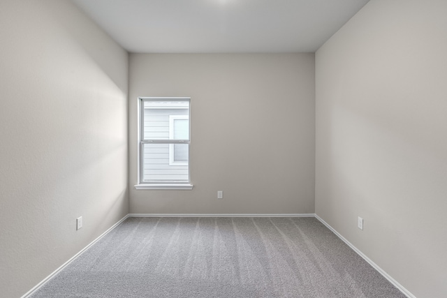 unfurnished room with carpet