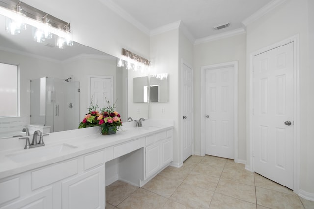 bathroom with tile patterned floors, walk in shower, vanity, and crown molding