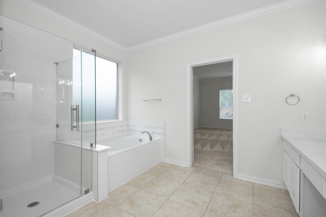 bathroom featuring tile patterned floors, crown molding, vanity, and separate shower and tub