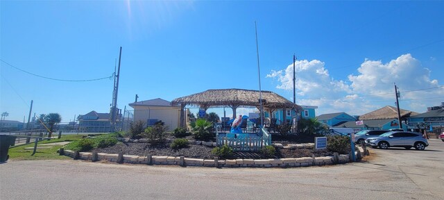 4015 Navarro Dr, Galveston, TX 77554 - exterior space with fence and a gazebo