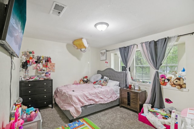 bedroom with light colored carpet