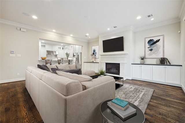 living room featuring crown molding and dark wood-type flooring