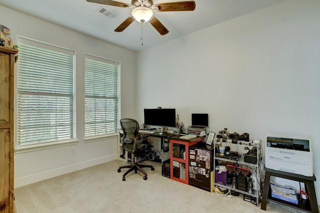 office area featuring carpet floors and ceiling fan