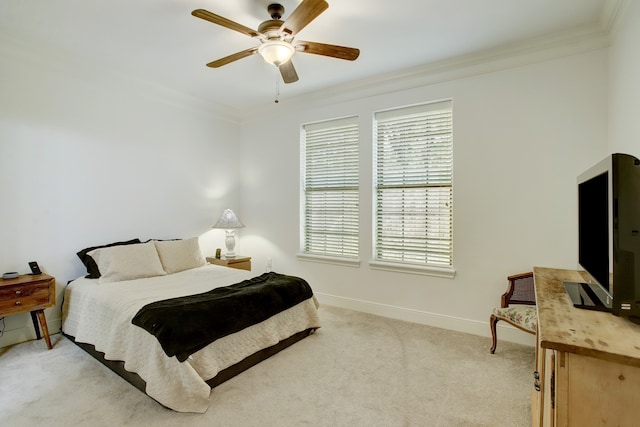 bedroom with light carpet, ceiling fan, and ornamental molding