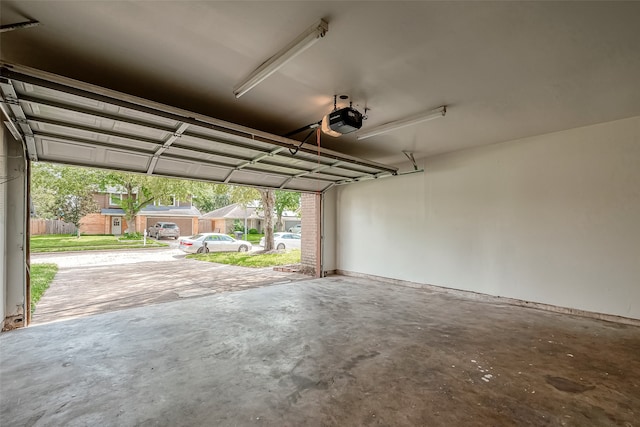 garage featuring a garage door opener