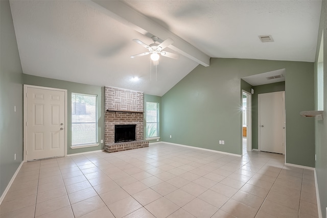 unfurnished living room featuring vaulted ceiling with beams, a fireplace, light tile patterned floors, and ceiling fan