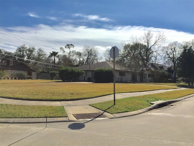 view of front of property with a front lawn