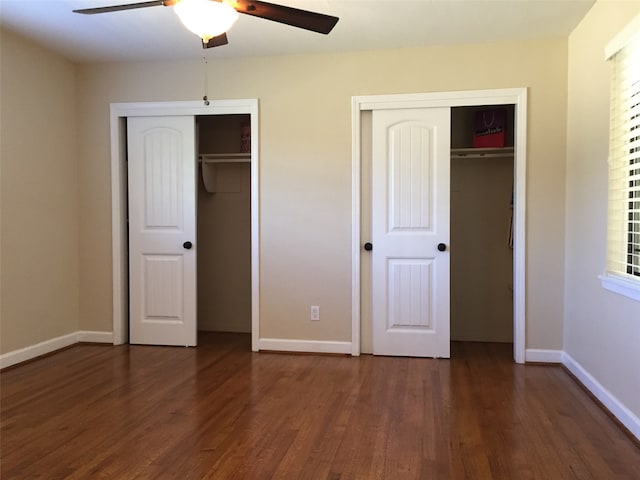 unfurnished bedroom featuring dark hardwood / wood-style floors and ceiling fan