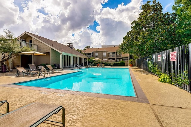 view of pool featuring a patio