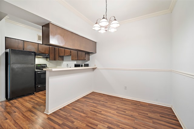 kitchen with appliances with stainless steel finishes, dark wood-type flooring, kitchen peninsula, dark brown cabinetry, and a chandelier