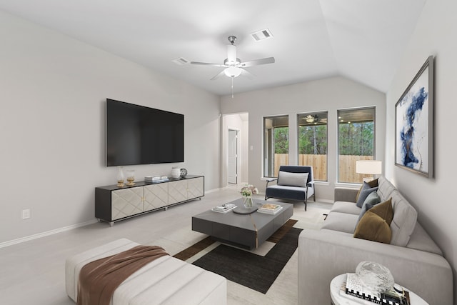 living area featuring lofted ceiling, baseboards, visible vents, and a ceiling fan