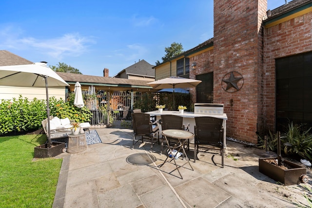 view of patio / terrace featuring exterior bar