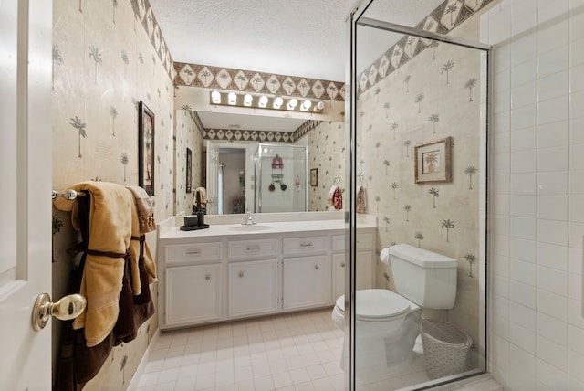 full bathroom featuring wallpapered walls, tile patterned floors, a textured ceiling, and vanity