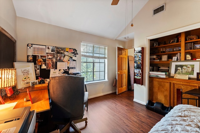 office space with visible vents, baseboards, ceiling fan, dark wood-style flooring, and high vaulted ceiling