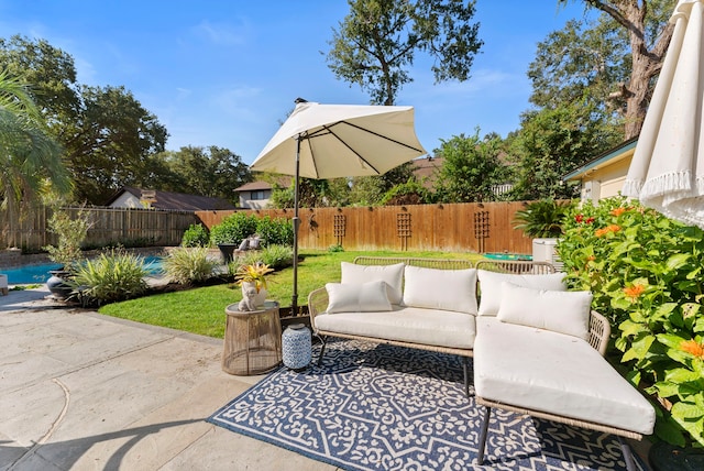 view of patio featuring a fenced backyard and an outdoor hangout area