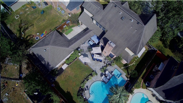 birds eye view of property with a residential view