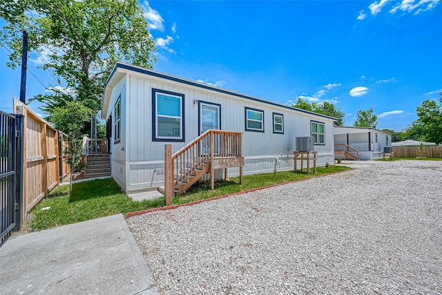 manufactured / mobile home featuring central AC unit