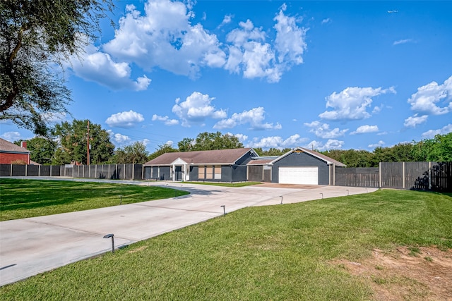 ranch-style home with a front yard and a garage