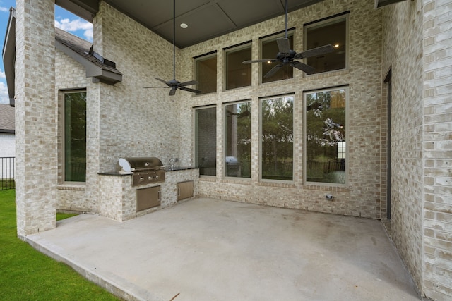 view of patio featuring ceiling fan and area for grilling