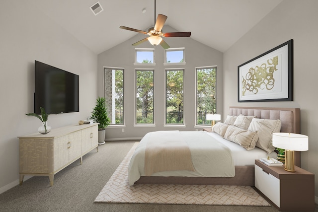 bedroom with vaulted ceiling, ceiling fan, and light colored carpet