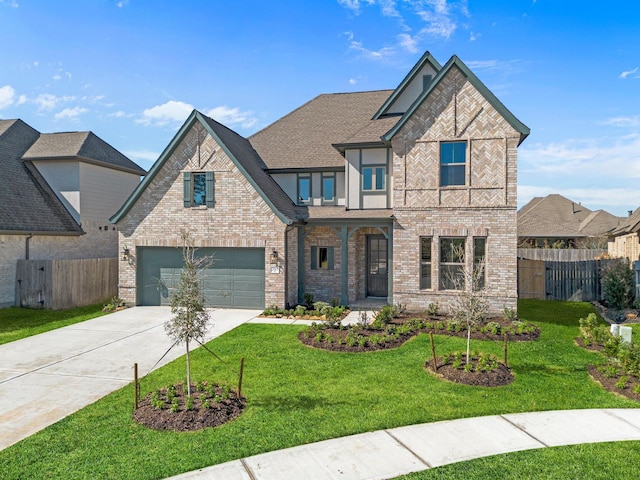 view of front of property with a shingled roof, brick siding, fence, concrete driveway, and a front lawn