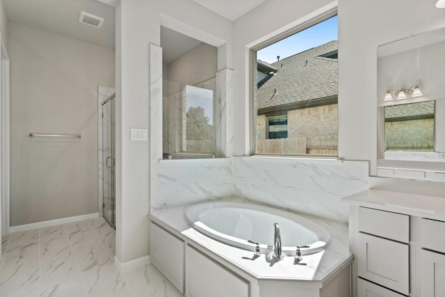 bathroom with vanity, visible vents, marble finish floor, a bath, and a stall shower