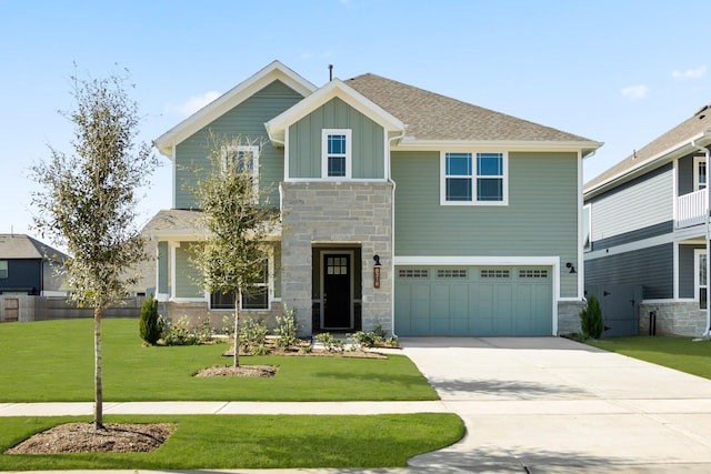 craftsman-style home with a front yard and a garage