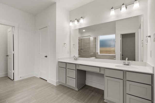 bathroom with vanity and walk in shower