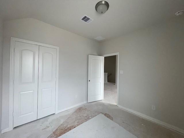 unfurnished bedroom with a closet