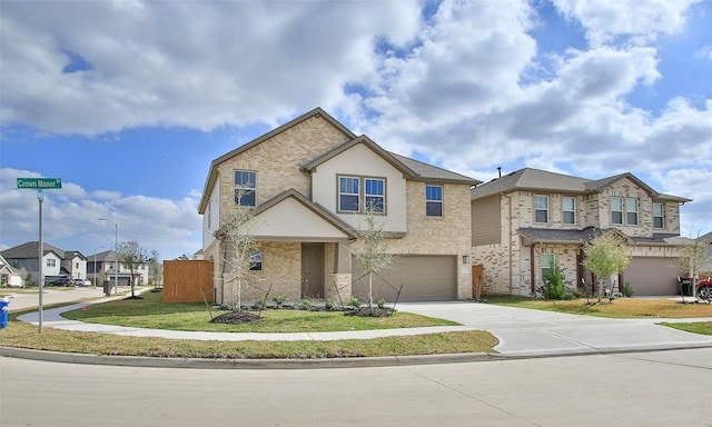 view of front of house with a garage and a front lawn