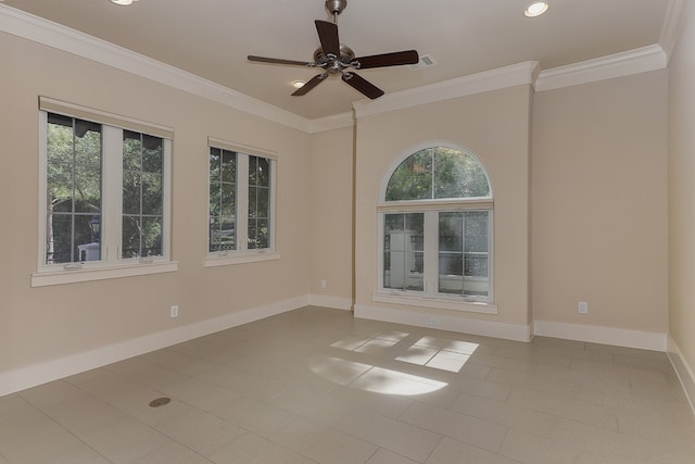 empty room with ceiling fan, light tile patterned flooring, and crown molding